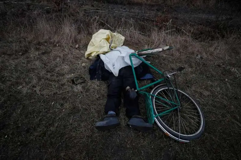 The body of a civilian lying outdoors in Bucha after the Russian withdrawal