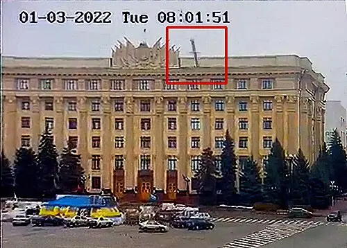 Surveillance camera frame time-stamped 01-03-2022 08:01:51 showing a missile, marked with a red box, just above the roof of the Kharkiv regional administration building