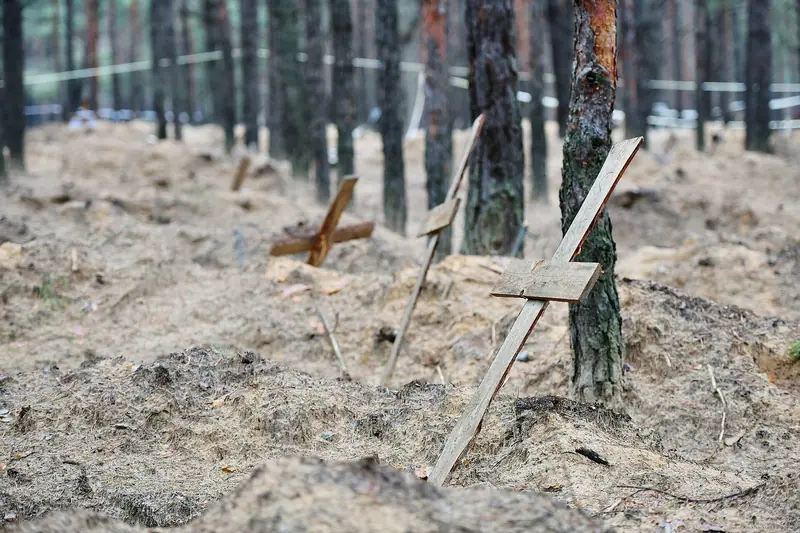 The Izium forest burial site in December 2022, after the exhumation