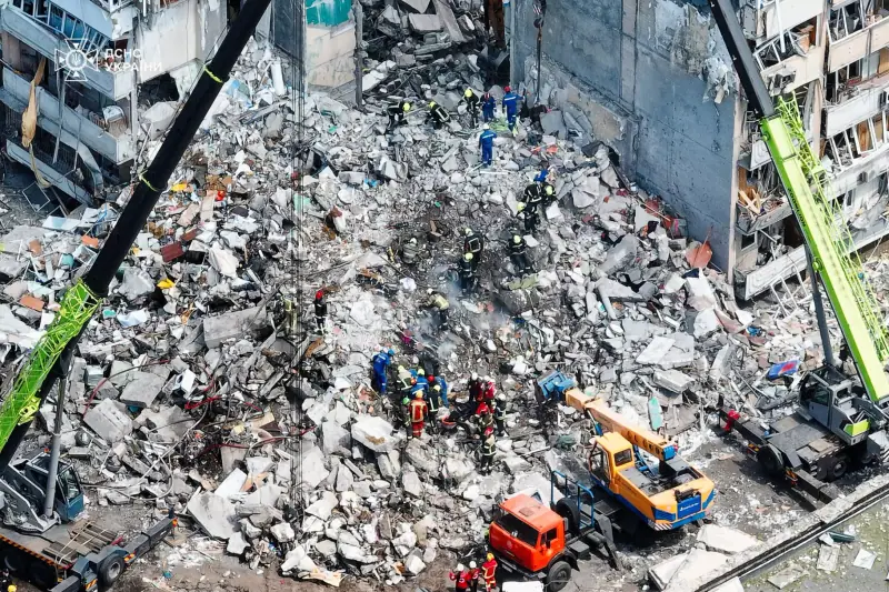 A partly destroyed residential building in Kyiv's Darnytskyi district